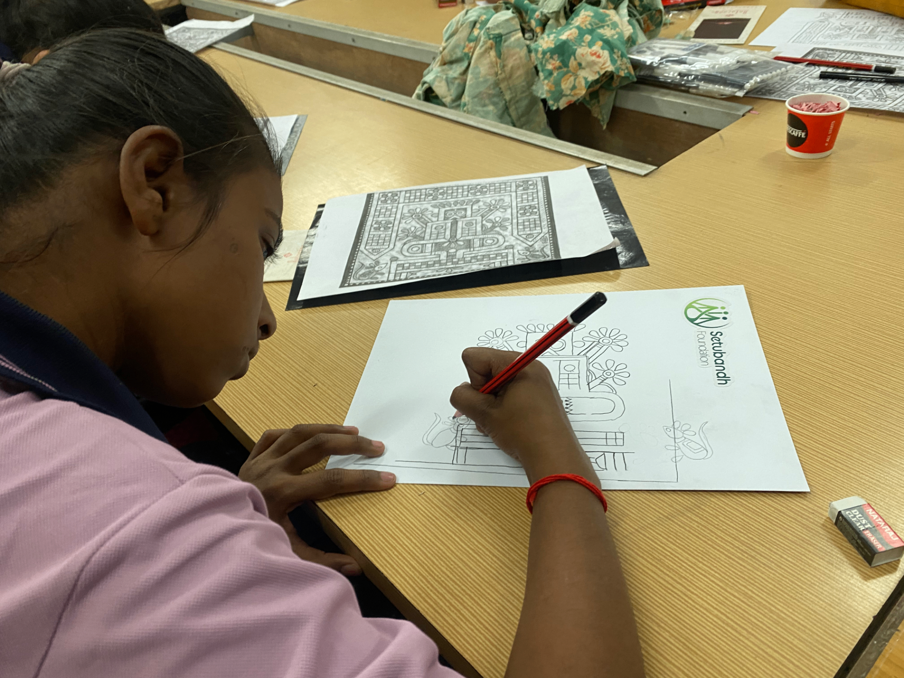 Artisan working on drawing
