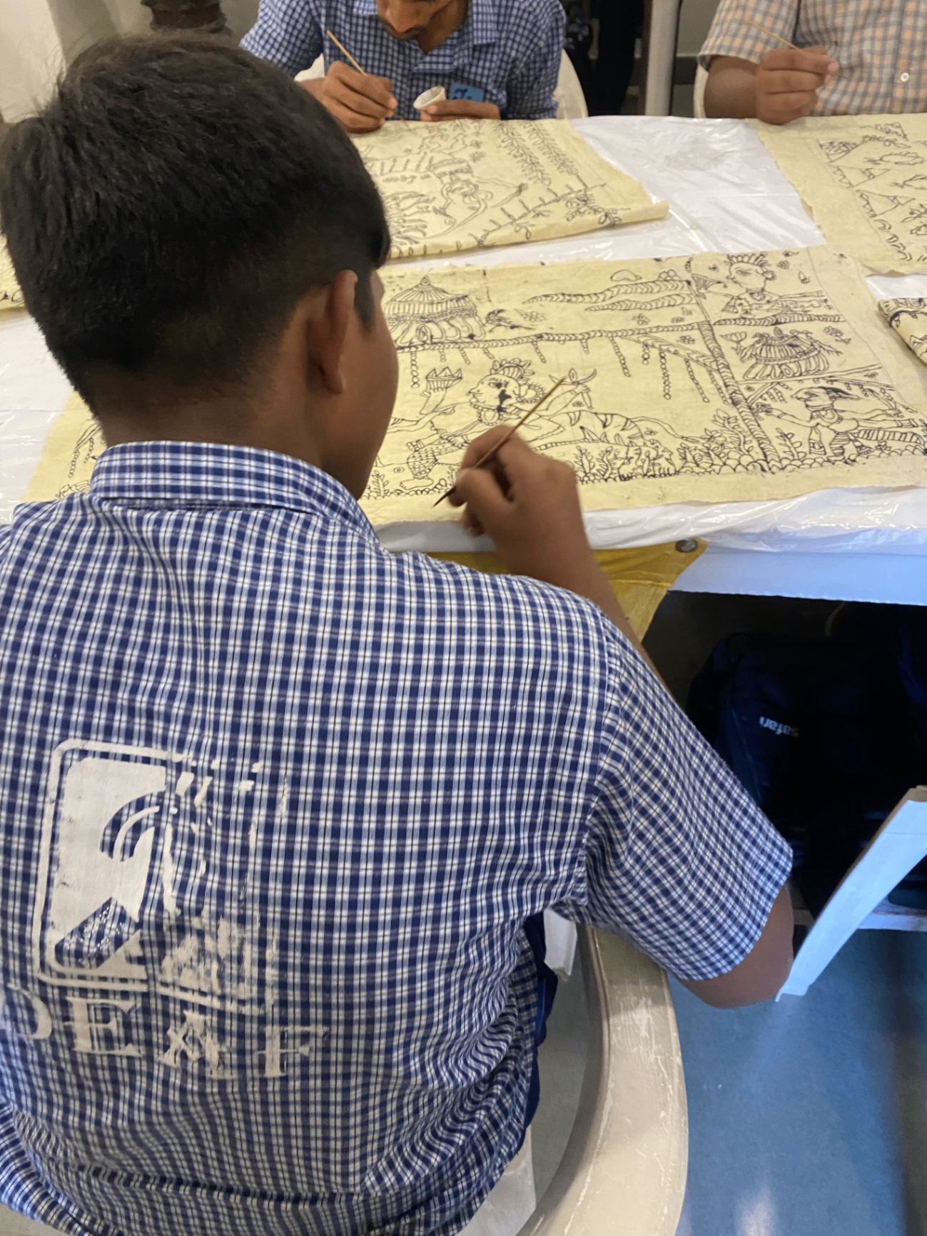 Artisan drawing detailed design